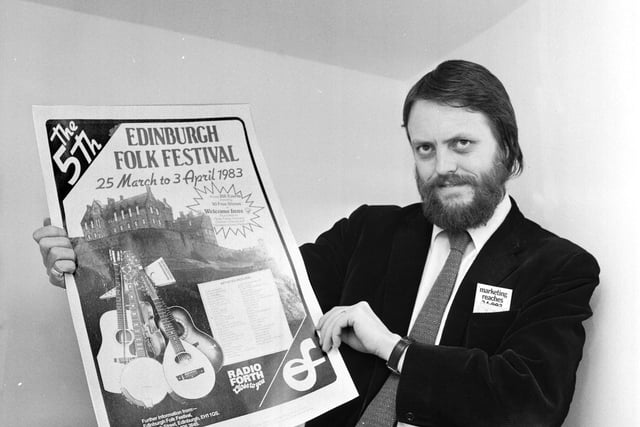 John Barrow organiser of the Edinburgh Folk Festival with a promotional poster in April 1983.