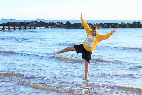 John takes a chilly dip to support Marie Curie festive campaign