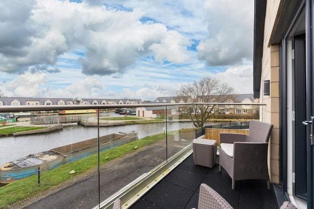 The balcony of the property offers great views of the canal and the marina.