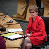 First Minister Nicola Sturgeon before giving an update on Covid restrictions in the Scottish Parliament.