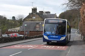 The number 101 Stagecoach bus heading east through West Linton in the Scottish Borders.