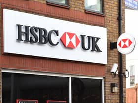 EMBARGOED TO 0001 WEDNESDAY APRIL 13 File photo dated 24/01/17 of a customer using a cash machine at a branch of HSBC in Tooting Broadway, London, as people experiencing domestic abuse can now walk into any HSBC branch in the UK to access a safe space and seek support and advice.