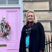 Miranda Dickson is angry that the council is threatening here with a fine over her pink door