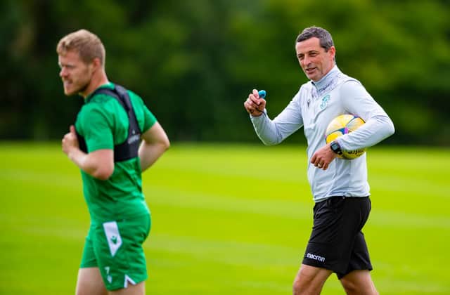 Daryl Horgan takes part in training at East Mains as head coach Jack Ross looks on