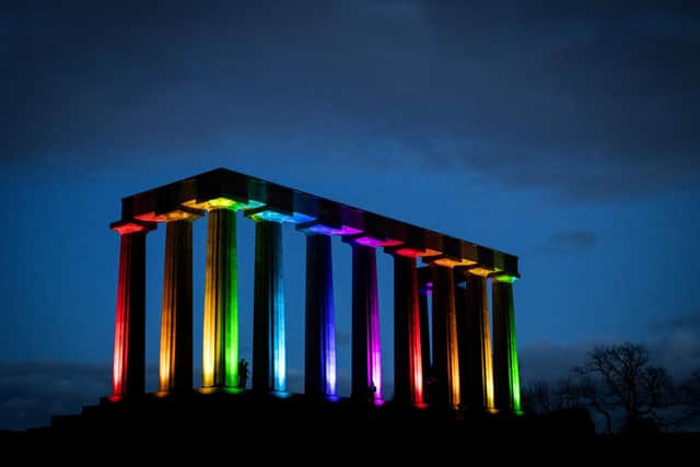 The National Monument on Calton Hill has been lit up by the Global Rainbow art installation by Yvette Mattern. Picture: Jane Barlow/PA Wire