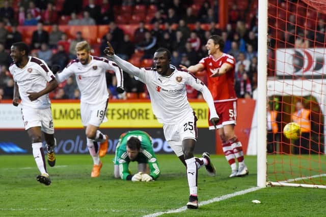 Abiola Dauda celebrates scoring the only goal of the game as Hearts defeat Aberdeen at Pittodrie in 2016. Picture: SNS