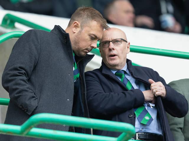 Hibs CEO Ben Kensell, left, speaks to director of football Brian McDermott during Saturday's 2-1 victory over St Mirren