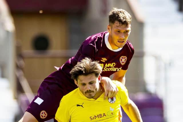 Hearts trialist Joe Wright challenges Bonnyrigg Rose's George Hunter during a 5-0 friendly win at Tynecastle Park. Picture: Roddy Scott / SNS