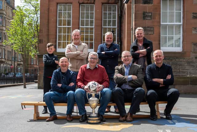 Footballers from Bruntsfield Primary School meet up to mark the 50th anniversary of their 1971 Bruntsfield boys School Board cup win. Back Row left to right. Nine year old Aidan McInally grandson of the late Brian Gordon, David White, Gordon Mckenzie, Alan Watson. Front Row L-R Stuart Smith,David Graham (captain) David Larter, Brian Mclean.