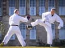 The Lib Dem leader taking part in a karate lesson with Robert Steggles at the Meadows.  Pic: Jane Barlow