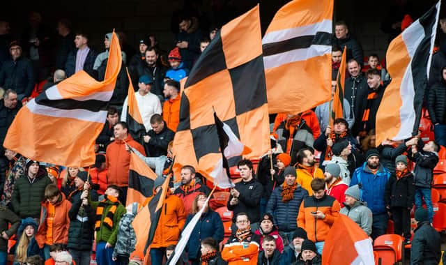 Two Dundee United fans have raised nearly £10,000 to help pay for the cub's legal fees. Picture: SNS