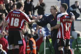 Michael Tongue (left) with former Blades boss Neil Warnock (centre) and fellow youth academy graduate Nick Montgomery in his Sheffield United days.