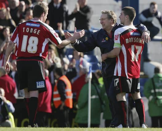 Michael Tongue (left) with former Blades boss Neil Warnock (centre) and fellow youth academy graduate Nick Montgomery in his Sheffield United days.