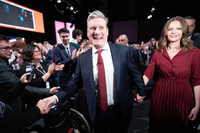 Labour leader Keir Starmer, with his wife Victoria, leaves the stage after giving his keynote address to the party conference in Liverpool (Picture: Stefan Rousseau/PA Wire