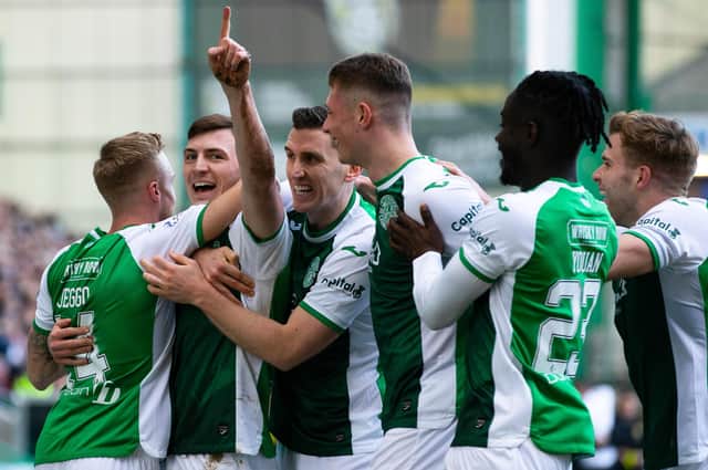 Josh Campbell, second left, is surrounded by his Hibs team-mates after scoring his second goal against Aberdeen. Picture: SNS