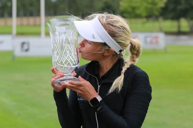 Gabrielle Macdonald kisses the trophy after her play-off win in the Allerum Open in Sweden. Picture: LET Access Series