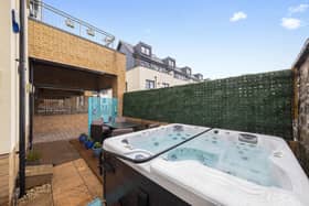 The property features delightful, beautifully planted private front, side and rear gardens, complete with a hot tub for relaxing after a hard day's work or just chilling on a day off.