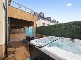 The property features delightful, beautifully planted private front, side and rear gardens, complete with a hot tub for relaxing after a hard day's work or just chilling on a day off.