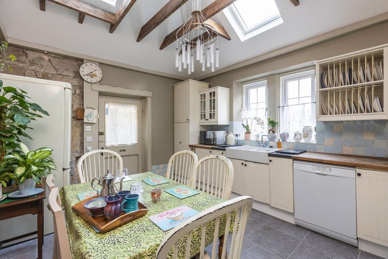 The stylish fitted dining kitchen with appliances and beautiful exposed beams.