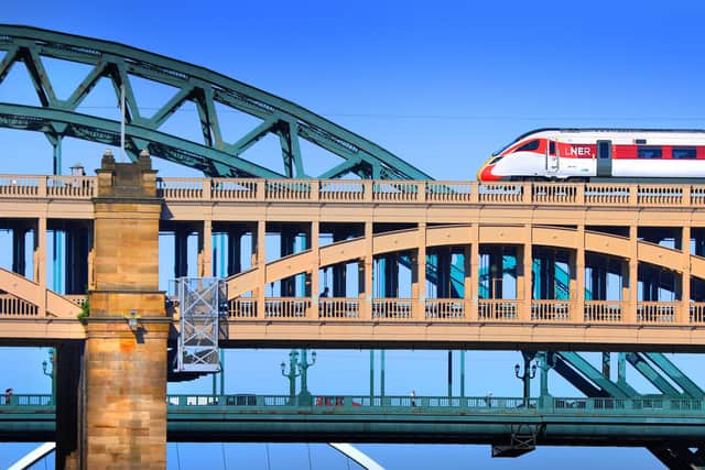 An LNER Azuma passes Newcastle's famous Tyne Bridge