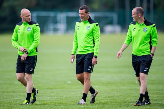 David Gray alongside manager Jack Ross and assistant John Potter at Hibs training. Picture: SNS