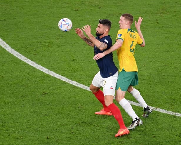 Kye Rowles challenges France striker Olivier Giroud during Australia's 4-1 defeat in their opening match of the 2022 World Cup in Qatar. Picture: Getty