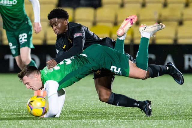 Stephane Omeonga battles Josh Campbell for possession during Hibs' 1-0 defeat to Livingston earlier in the season. Picture: SNS