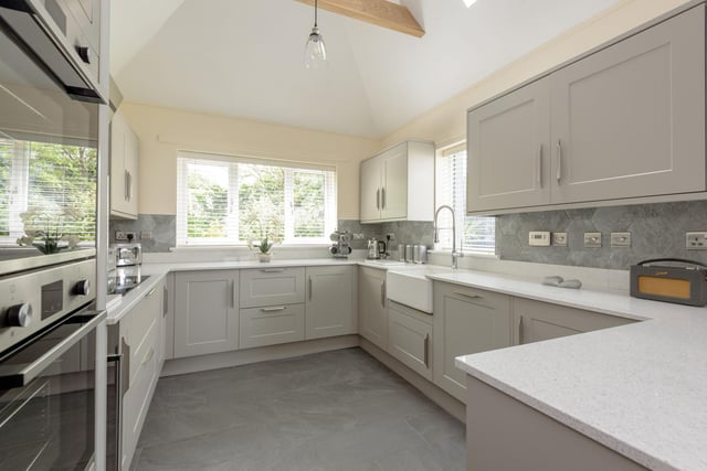 Internally, the immaculately presented and well proportioned accommodation comprises of a vestibule, hall, double aspect kitchen/dining room with vaulted ceiling, ample room for dining and relaxing and double doors leading out to a decked area and private gardens.