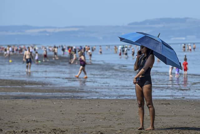 Members of the public at Portobello Beach amid today's heatwave. Picture: Lisa Ferguson