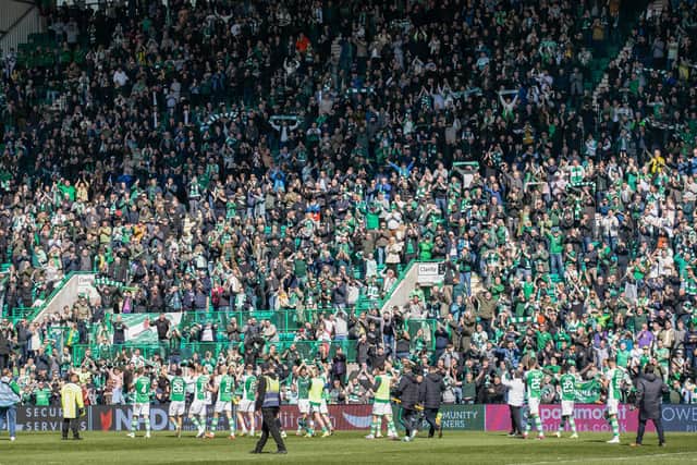 The home crowd applaud the effort of the players after Hibs defeat Hearts in the Edinburgh derby at Easter Road. Picture: SNS