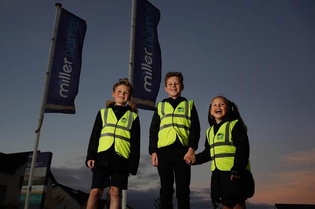 Miller Homes is running its Home Safe campaign for a second year across Scotland, providing high-vis vests to help children walk to school safely in the winter months. Picture by Stewart Attwood.