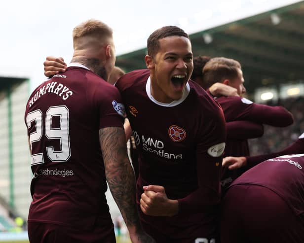 Hearts players celebrate Toby Sibbick's goal in the 3-0 win over Hibs.