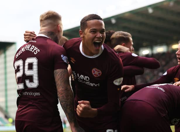 Hearts players celebrate Toby Sibbick's goal in the 3-0 win over Hibs.
