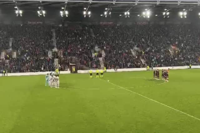 A minute's silence held for The Queen at Tynecastle had to be cut short