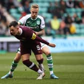 James Jeggo, right, made his debut for Hibs in Sunday's Edinburgh derby defeat to Hearts at Easter Road. Picture: SNS
