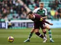 James Jeggo, right, made his debut for Hibs in Sunday's Edinburgh derby defeat to Hearts at Easter Road. Picture: SNS