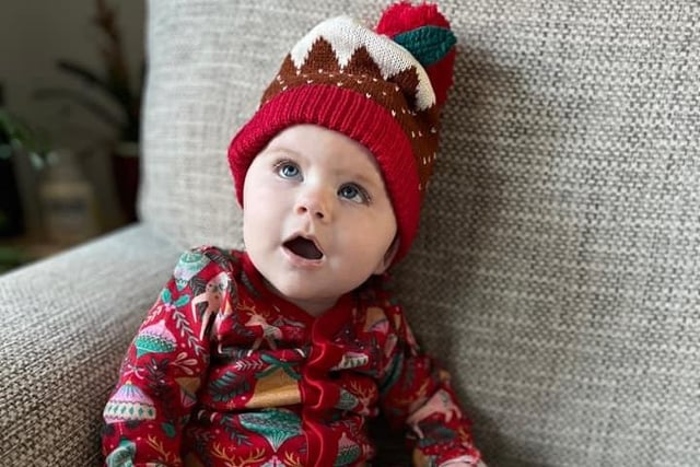 Five month old Grace has a Christmas pudding hat. Submitted by Laura Dudley.