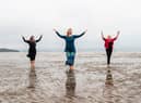 Performers Nerea Bello and  Mairi Morrison joined theatremaker Julia Taudevin on Silverknowes Beach to help launch this year's Made in Scotland showcase at the Fringe. Picture: Lisa Ferguson