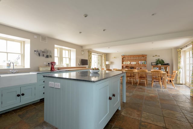 The well appointed kitchen/dining room comes with an Aga cooker.