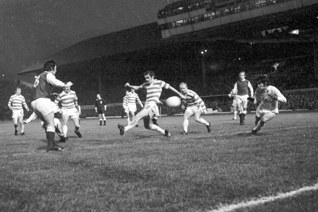 Stanton (partially hidden by Jimmy O'Rourke) strikes to give Hibs the lead at Hampden