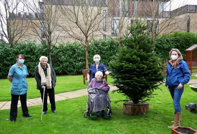 Deborah Gammell, donating a Christmas tree to Murrayfield Care Home, Edinburgh