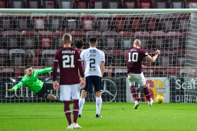 Fresh from scoring the winning penalty for Nothern Ireland, Liam Boyce netted for Hearts from the spot against Dundee.