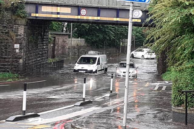 The road under Slateford Railway Bridge was badly flooded, with some vehicles becoming stuck.