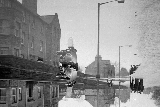 A burst water main burst flooded homes and streets in Gorgie Road in 1963.