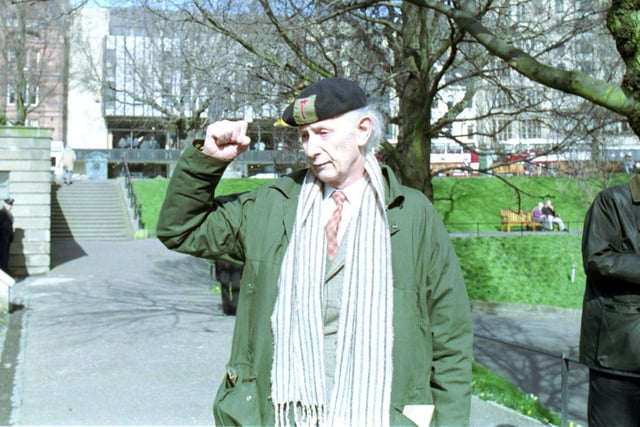 Old soldier John Dunlop gives a clenched fist salute at the International Brigade memorial in East Princes Street Gardens, March 1993.