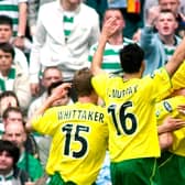 Scott Brown (right) is mobbed by his Hibs team-mates after scoring the away side's third goal on April 30, 2005. Pic: SNS Group Alan Harvey