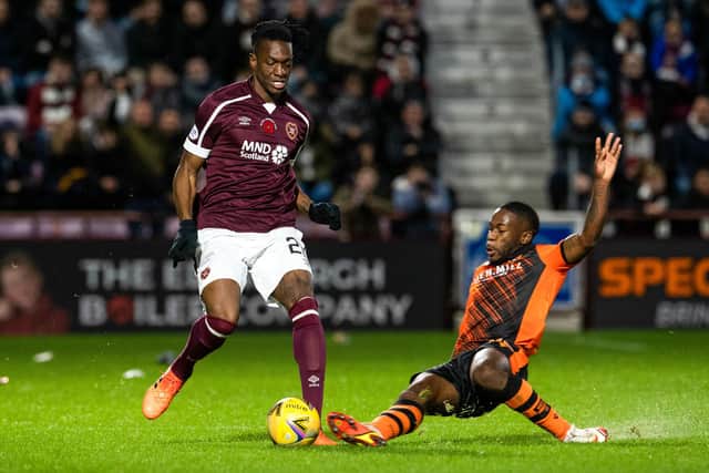 Arnaud Gnanduillet in action during Hearts' 5-2 win over Dundee United in October. Picture: SNS