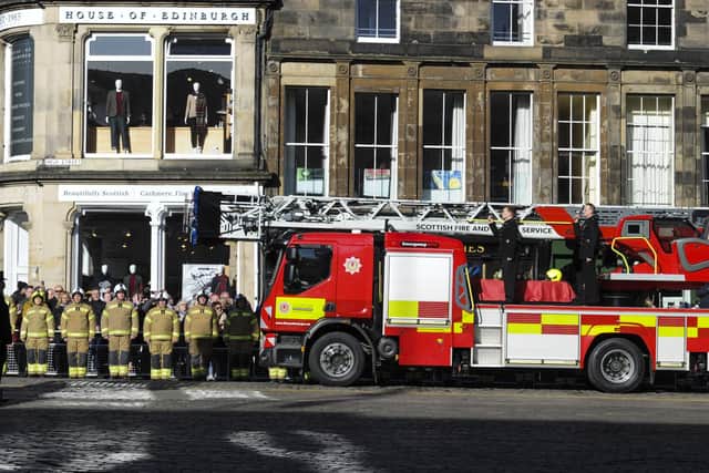 A fire engine carried Barry Martin's coffin to his funeral service at St Giles' Cathedral in Edinburgh