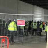 Images sent to the Evening News this morning show a lack of social distancing between workers on site