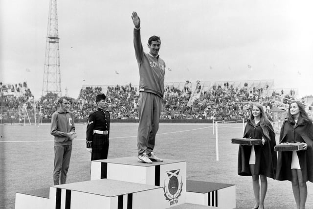 Scottish athlete Lachie Stewart mounts the podium to collect his gold medal, won in the Commonwealth Games 10,000 metres final at Meadowbank stadium Edinburgh in July 1970.